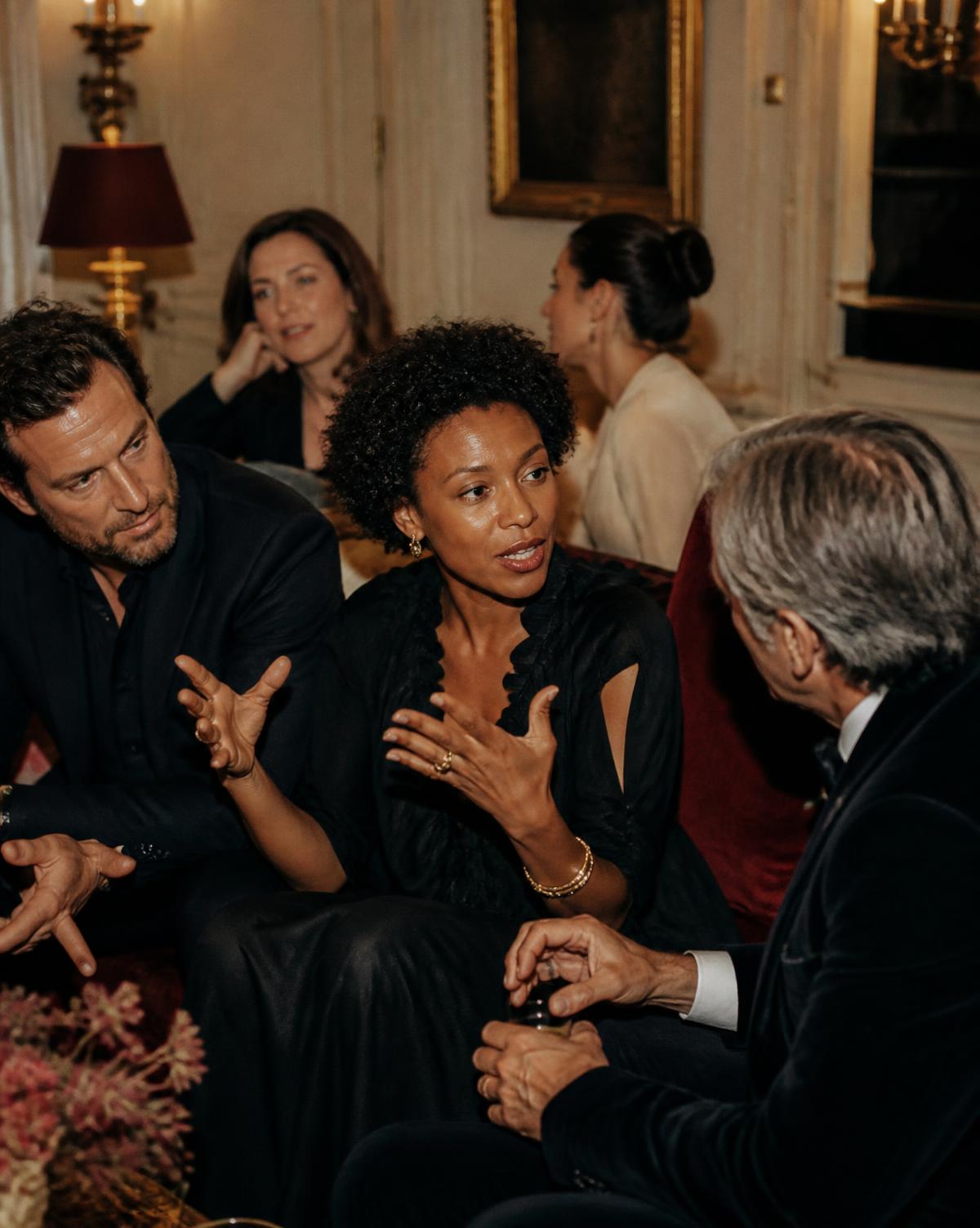 Guests engaged in a thoughtful guided conversation